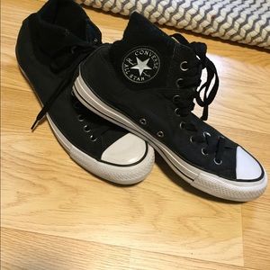 - Converse Chuck Taylor blue bottom